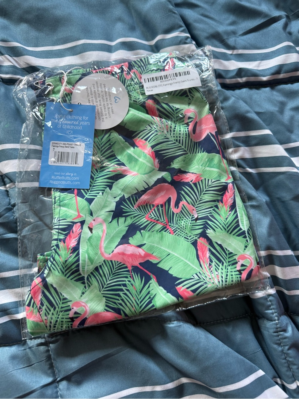 Boys Rugged Butts swim trunks. Tropical print. Size 7.